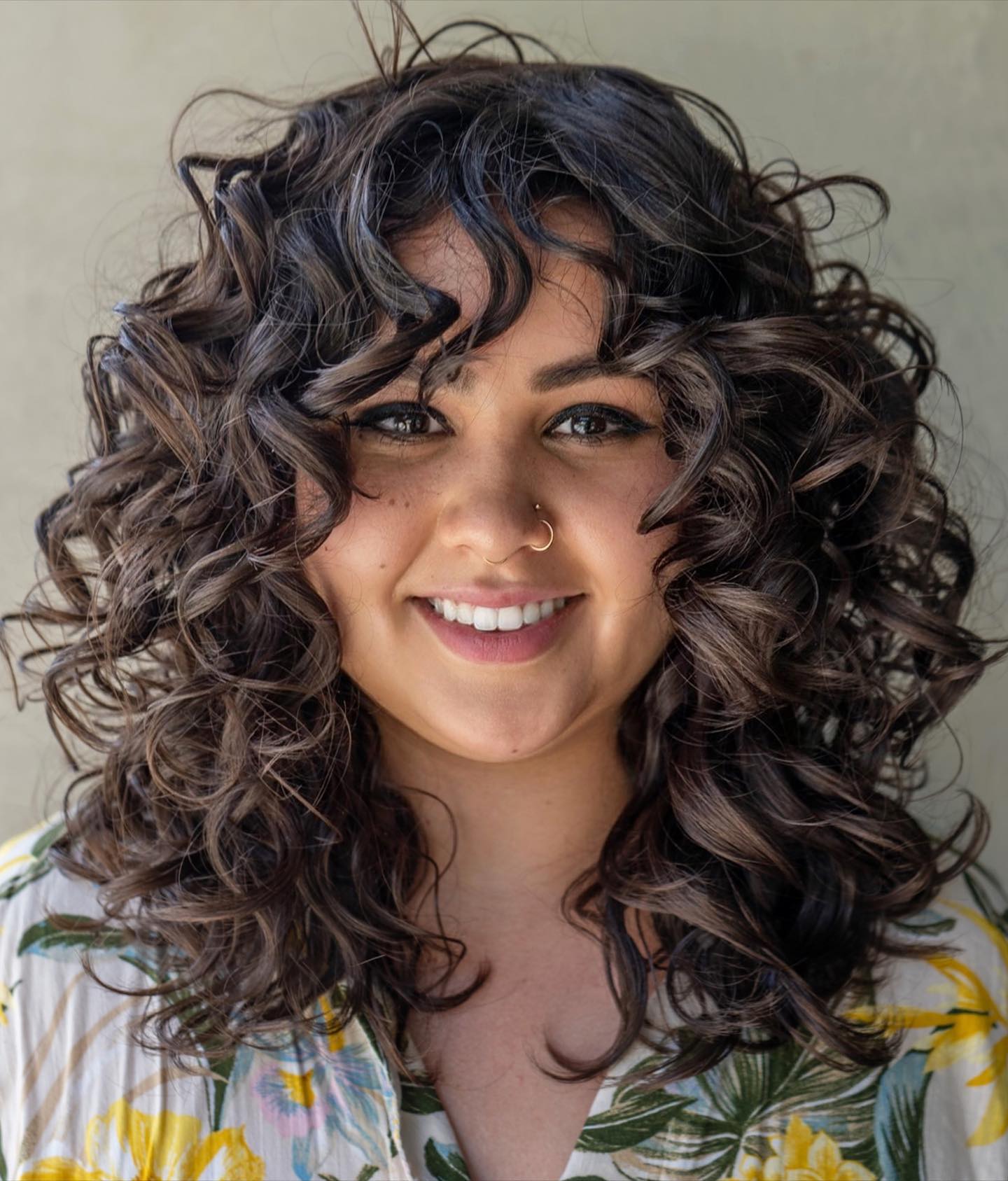 Long Hair with Bouncy Curls for a Chubby Face